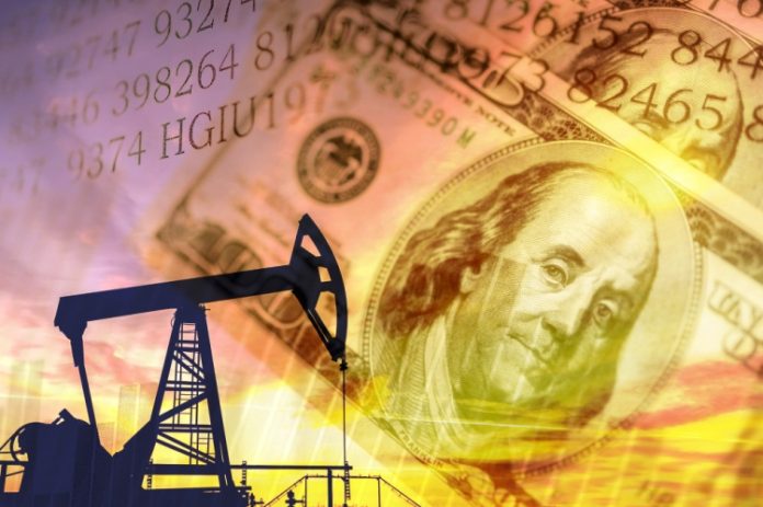 Доларот благо зајакна, цената на нафтата падна